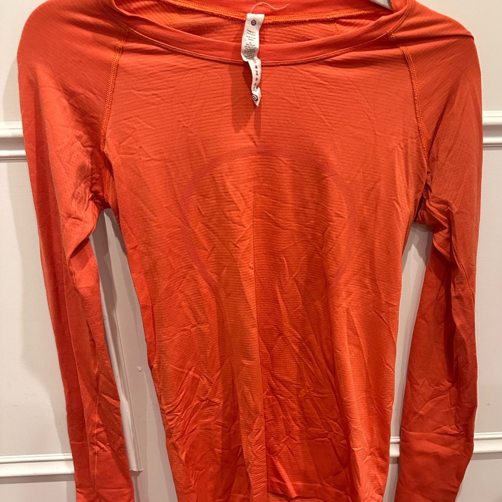 Orange lululemon *rare color* Swiftly Tech Long-Sleeve Shirt 2.0
Waist Length